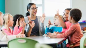 Daycare teacher with students