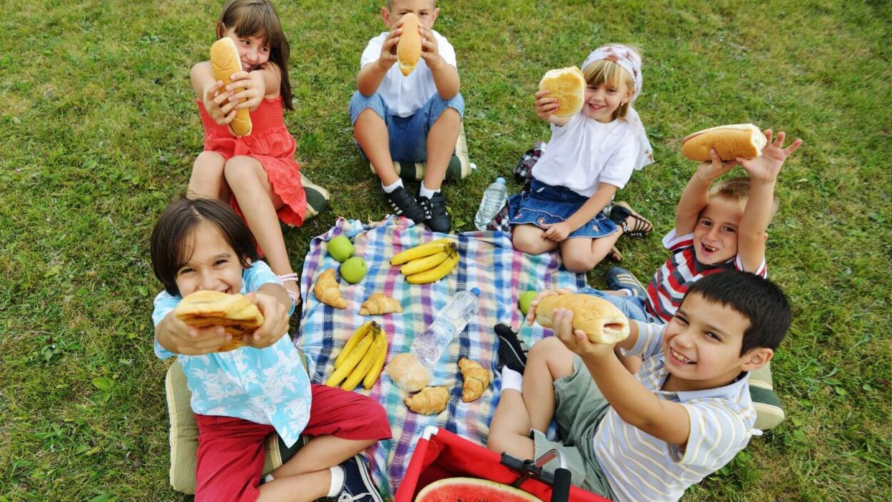 Children having a picnic at summer camp