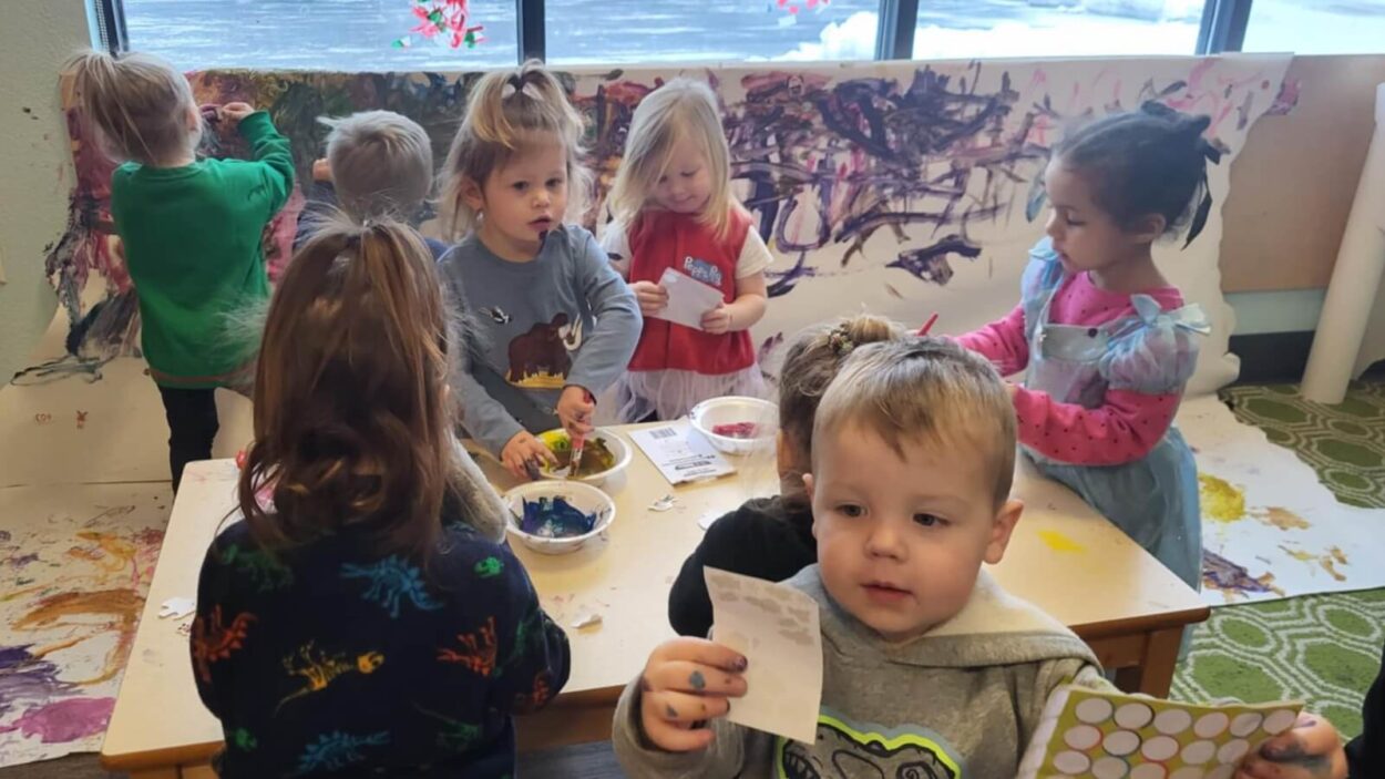 Kids finger painting at Cornerstone Academy