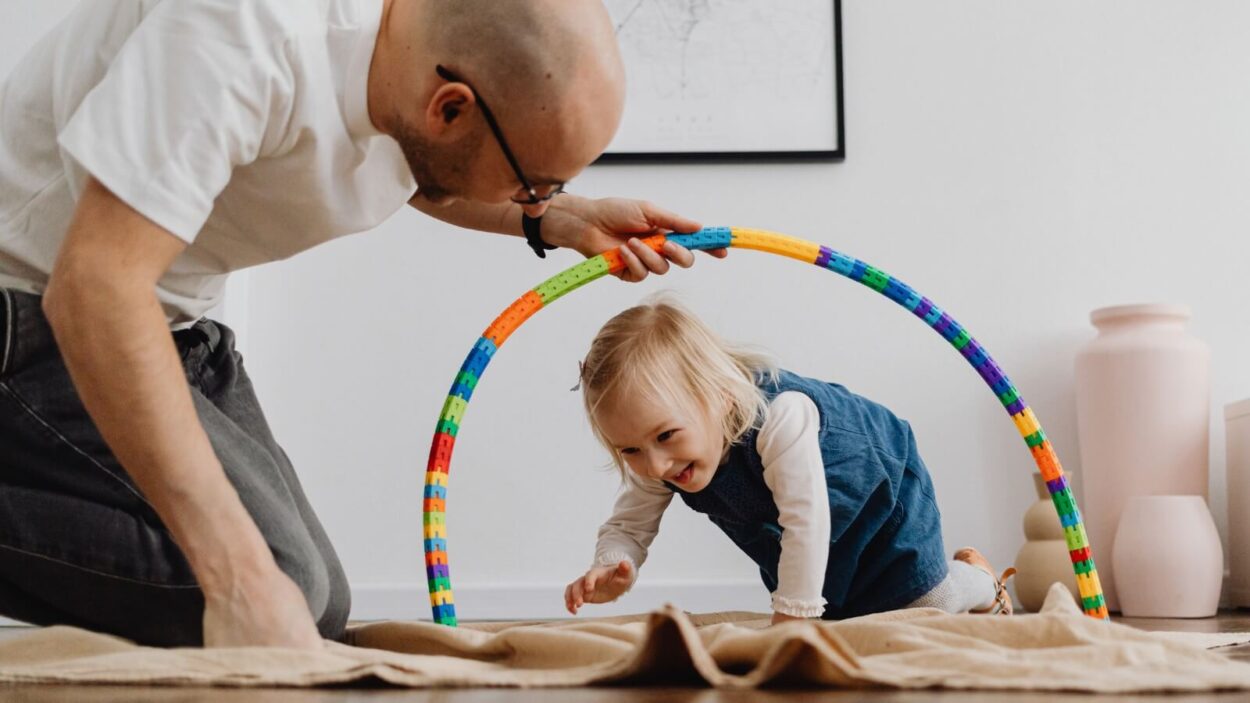 Parent playing with their child at home